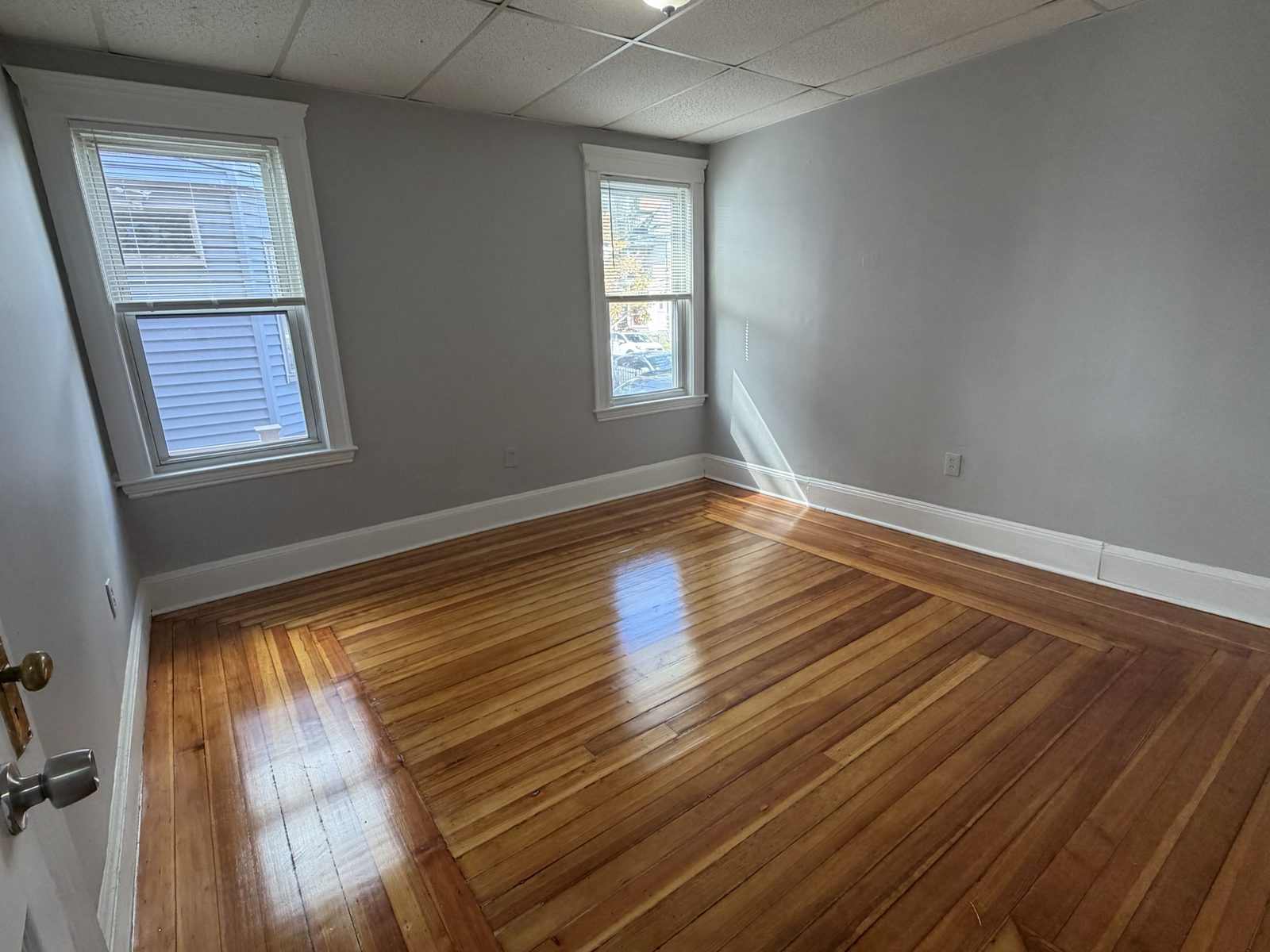 Bedroom with inlaid floor border